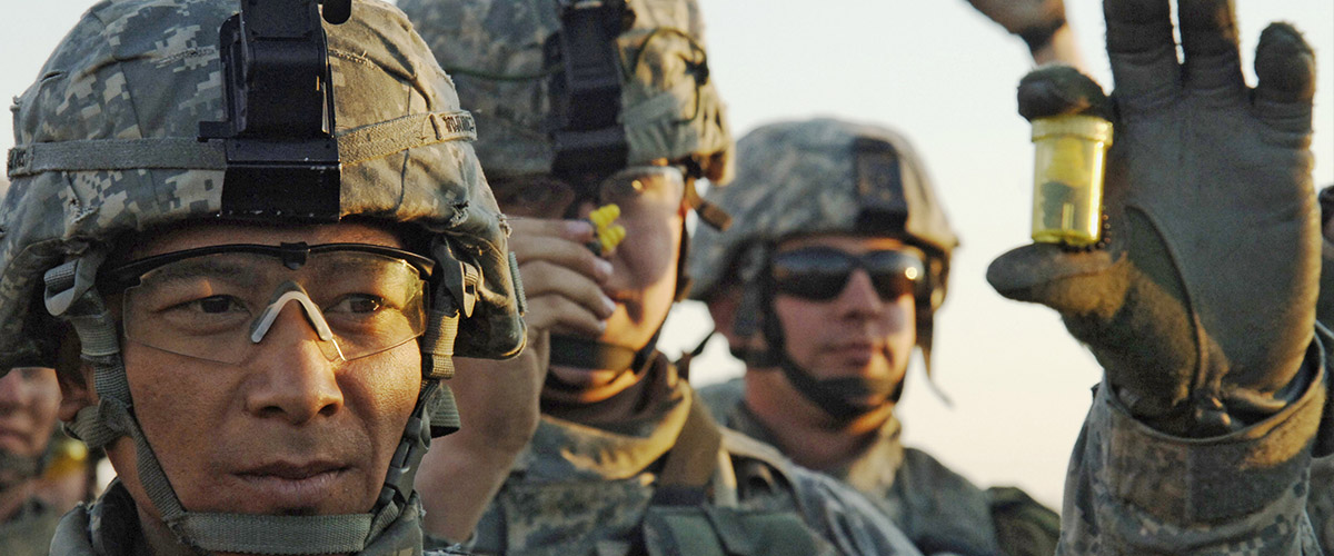 U.S. Army Pfc. Douglas Wojtowicz And Fellow Soldiers From The 2nd Battalion, 8th Cavalry Regiment Show Their Combat Ear Plugs During A Pre-combat Check At Camp Taji, Iraq, On Feb. 7, 2007, Prior To Conducting A Night Mission. These Earplugs Would Later Beome The Focus Of A Lawsuit.